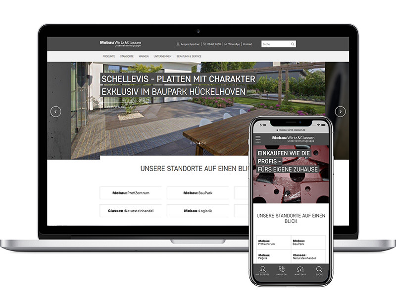 Ein Laptop und ein Smartphone zeigen dieselbe Baustoff-Website an.