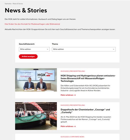 Screenshot einer Webseite mit dem Titel „News & Stories“. Sie enthält eine Navigationsleiste, Dropdown-Menüs zur Auswahl von Daten und eine Schaltfläche mit der Aufschrift „Artikel anzeigen“. Darunter befinden sich Abschnitte mit Daten, Bildern und Textzusammenfassungen von Nachrichtenartikeln.